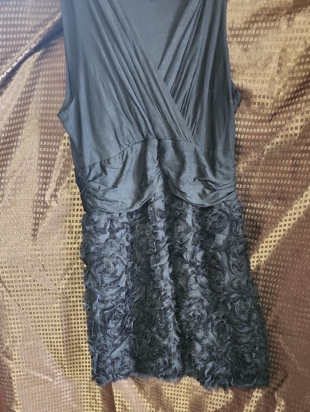 **Elegant Black Sleeveless Mini Dress with Rosette Skirt